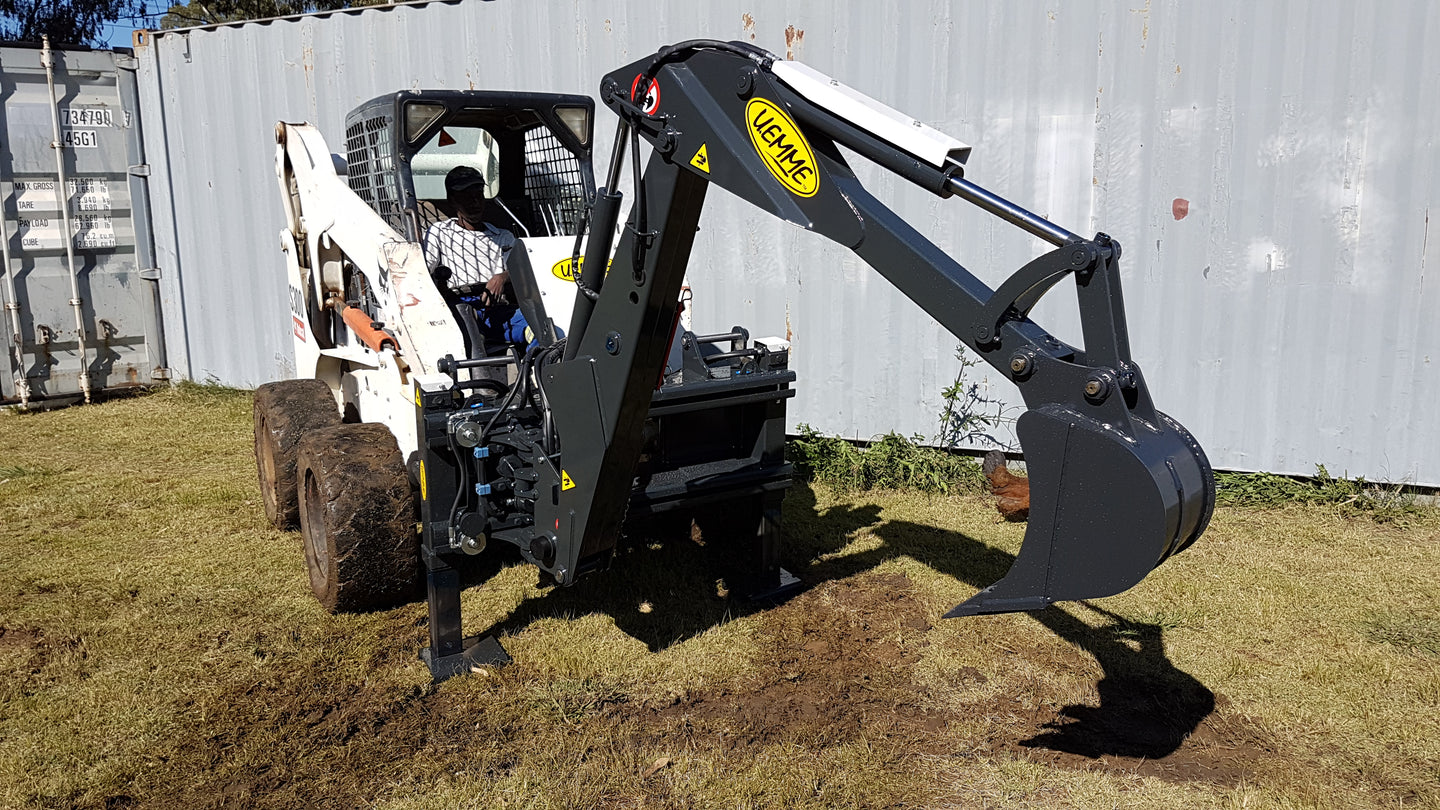 Backhoe framan á hjólaskóflur.